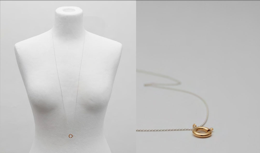 Sonja Bischur Spring/Summer 2011, delicate silver anchor chain with gold plated spring ring clasp pendant
