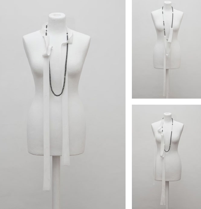 Sonja Bischur Spring/Summer 2011, double layered off-white silk ribbon affiliated with black imitation pearl necklace